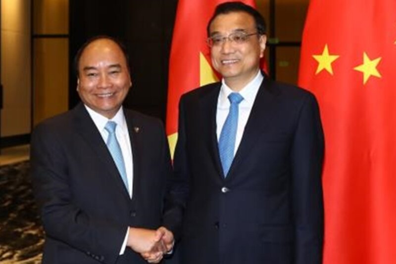 第31届东盟峰会: 越中一致同意推动双边贸易均衡发展